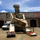 A giant sculpture lurks in Havana's La Cabana fort during the Bienal.
